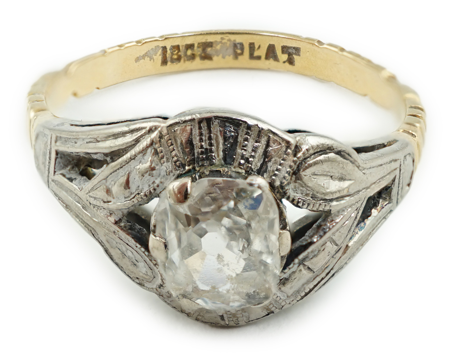 An early 20th century 18ct gold, platinum and solitaire old mine cut diamond set ring